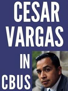 Blue background with words Vargas in Cbus in white and a photo headshot of a Latino looking man with black hair and a suit on