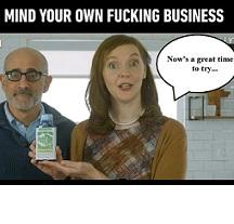 Bald man with glasses next to a young white woman holding a medicine bottle with a balloon quote saying Now's a great time to try... and at the top the words "Mind you own fucking business"