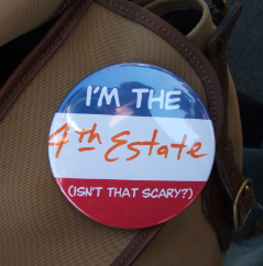 Button saying I'm the 4th estate, isn't that scary?