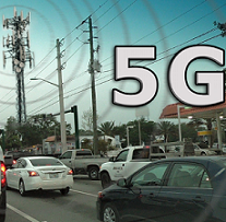 Words 5G with street scene with cars and a cell tower 