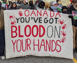 Sign saying Canada You've Got Blood on your Hands