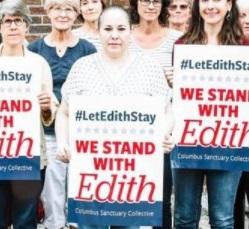 Edith and others holding signs