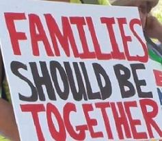 Sign saying families should be together