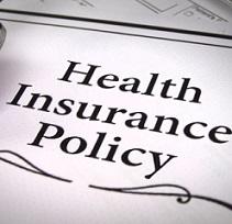 Words Health Insurance Policy with a squiggly line below