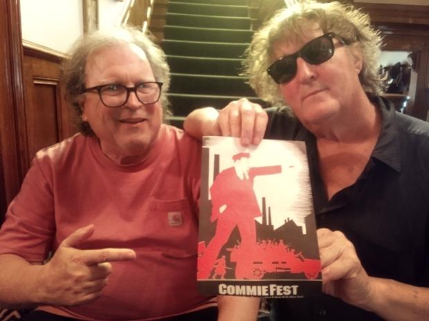 Bob and Dan showing a Comfest flyer