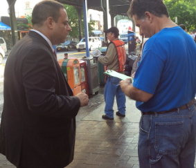 Man signing petition