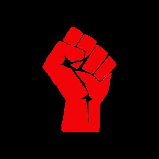 Red fist against black background
