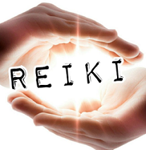 Two hands one on top one on bottom like they are holding the word Reiki which is glowing