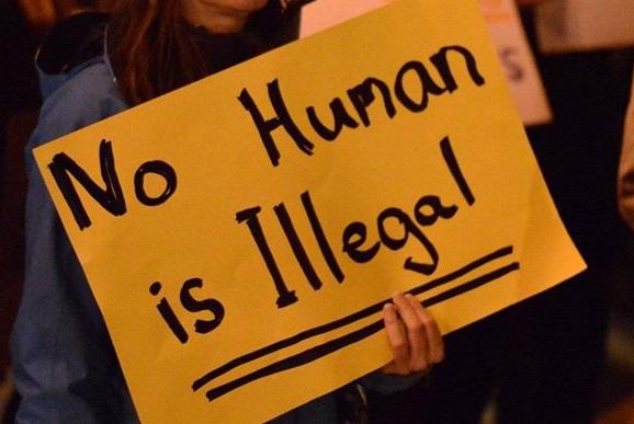 No human being is illegal sign