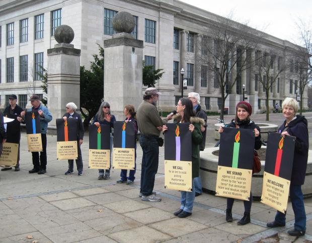 Members of Jewish Voice for Peace hold a symbolic menorah against racism and Islamophobia at the Ohio State University. 