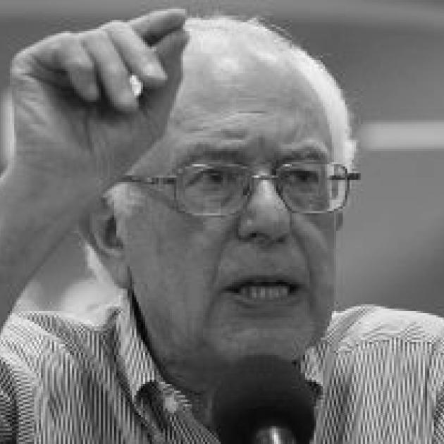 Black and white photo of Bernie Sanders gesturing as he talks