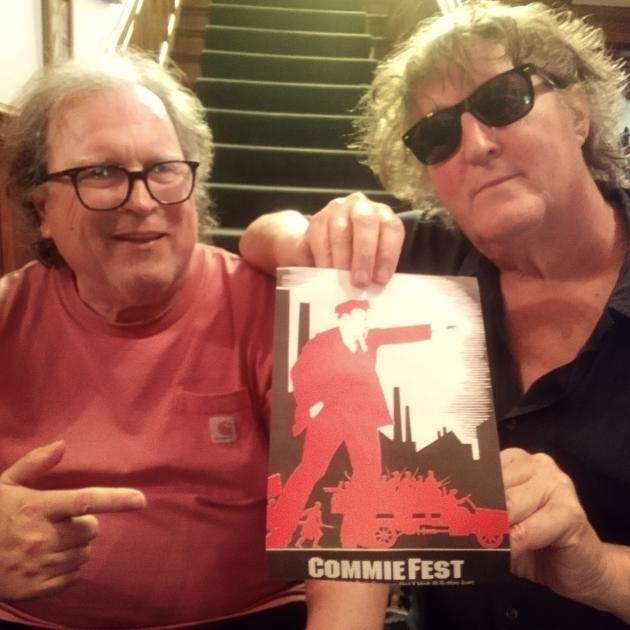 Bob and Dan showing a Comfest flyer