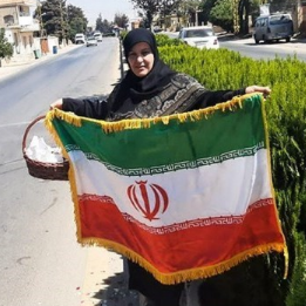 Woman holding Iranian flag
