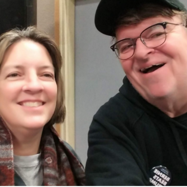 Cathy Cowan Becker and Michael Moore
