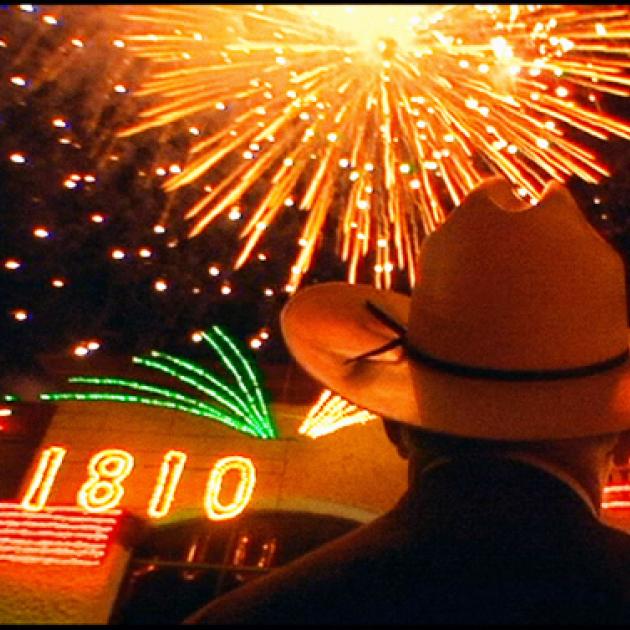Fireworks and a guy in cowboy hat