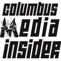Black words Columbus Media Insider with the M looking like broken  glass