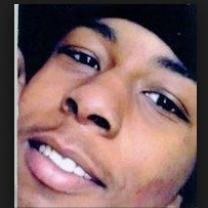 Young black man closeup of his face smiling
