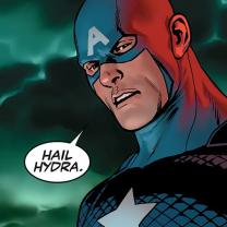 Guy dressed as superhero with star on chest and big A on forehead mask standing against stormy sky saying in a word bubble "Hail Hydra"