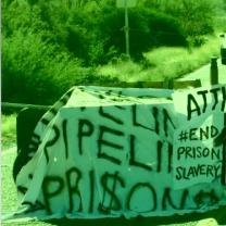 Banner about stopping prison slavery
