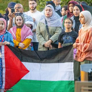 Group of people with a Palestinian flag
