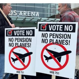 Men holding strike signs