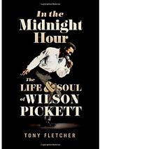 Book cover, black bakground, photo of black man bending over with a mic to his mouth singing and arm swinging backwards and the words In the Midnight Hour the life & soul of Wilson Pickett by Tony Fletcher 