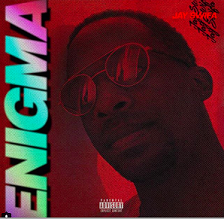 Red background with face of black man wearing sunglasses and the word ENIGMA in blue and pink running up the left side