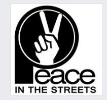 Black circle with white hand making peace sign with words Peace in the Streets