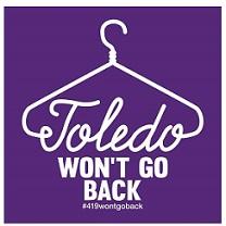 Purple background with drawing of white clothes hanger going into the word Toledo as the bottom of the hanger and then the words WON'T GO Back