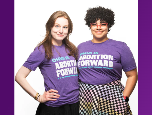 Two women in Abortion Forward shirts