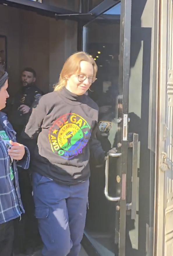 Young woman being arrested