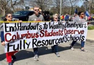 Banner about Columbus students needing resources