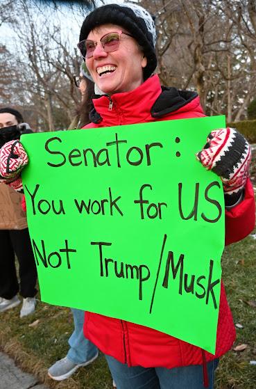 Protestor holding sign