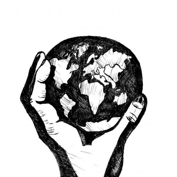 Black and white drawing of a hand holding the Earth