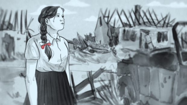 Woman next to bombed out buildings