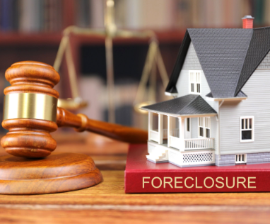 House, gavel and foreclosure sign