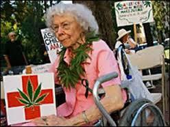 Elderly woman with marijuana sign
