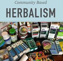Lots of tinctures and medicinal looking items below and the words Community Based Herbalism above