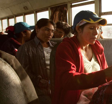 Farmworkers on a bus