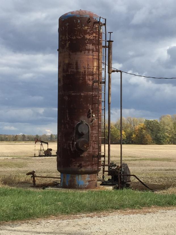 Tall metal structure out in a field - an injection well