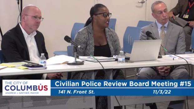 Three members of Civilian Review Board at a table