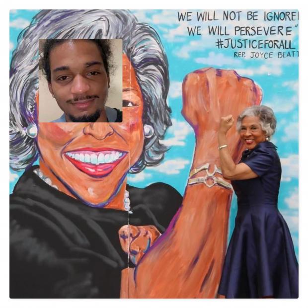 Joyce Beatty with Casey Goodson photo on her face