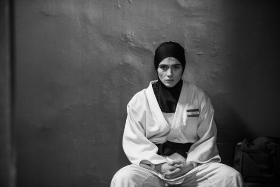 Person sitting in judo outfit