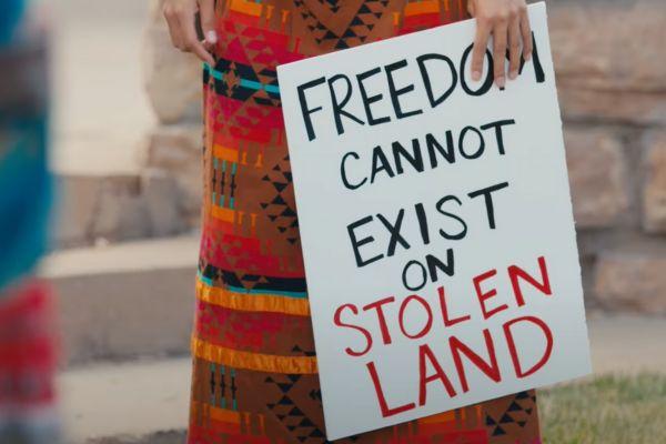 Sign saying Freedom Can't Exist on Stolen Land