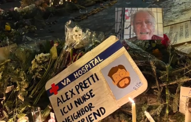 Dave Lippman and sign about Alex Pretti