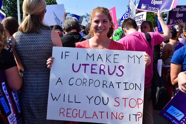 Woman holding a pro-choice sign