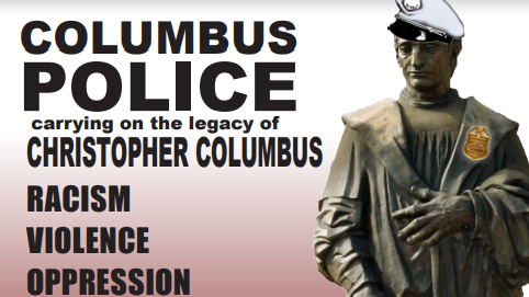 Columbus statue wearing a police hat and badge