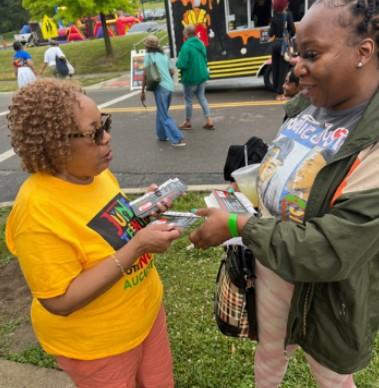 Two black women talking