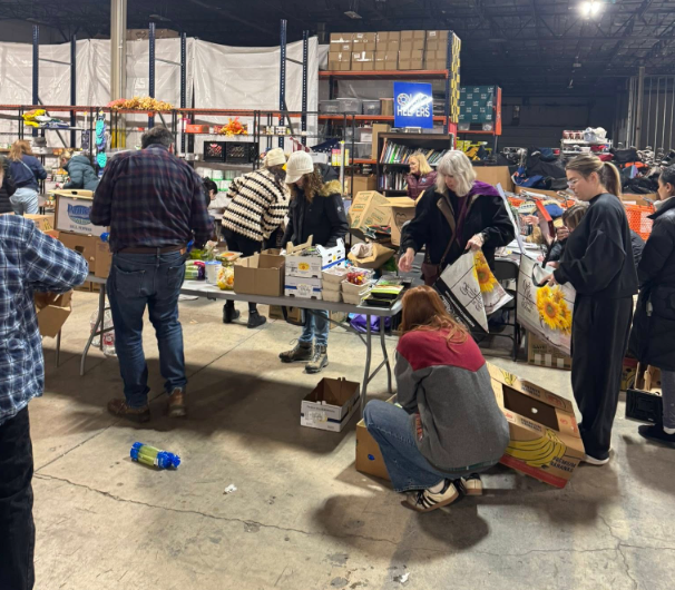 People in a food warehouse packing