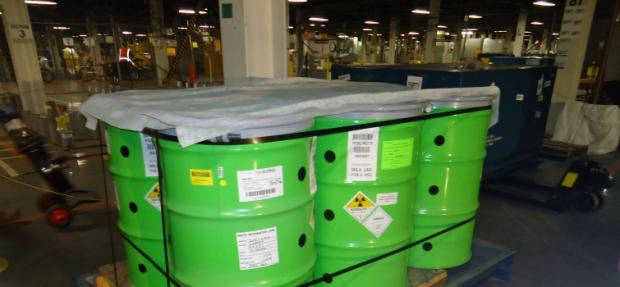 Green toxic waste barrels